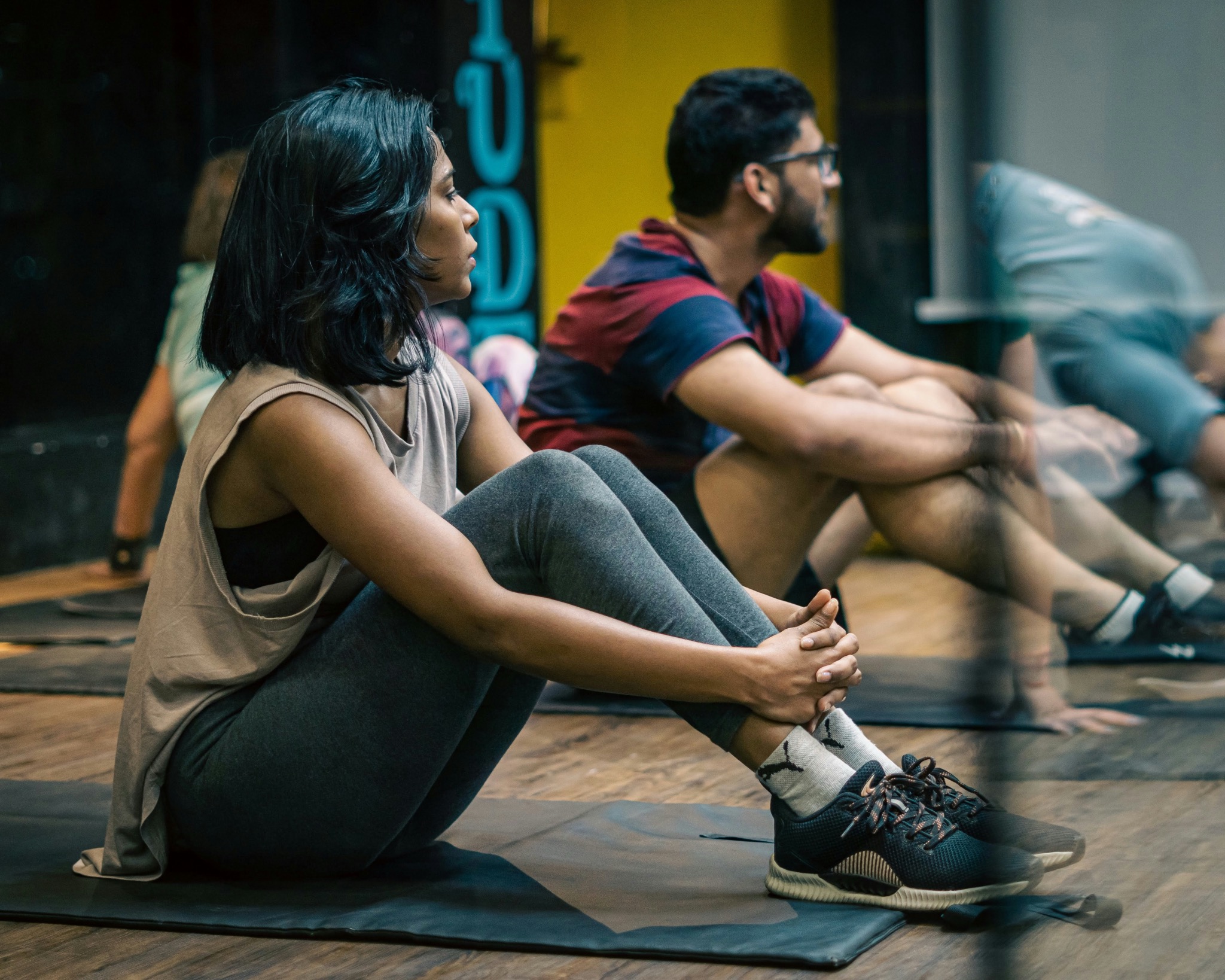 Student with yoga mat